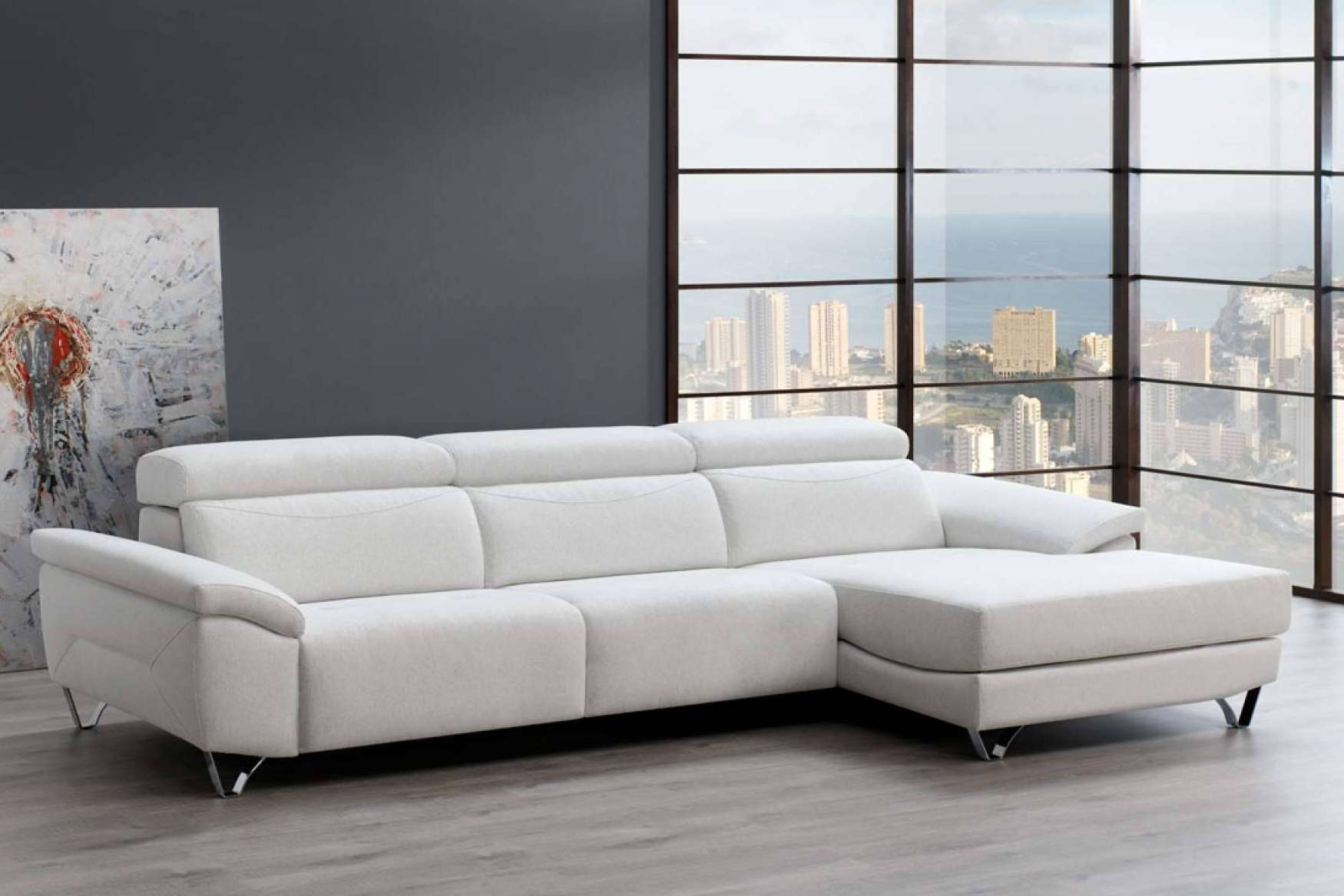 Muebles Industria dispone de sofás a medida y sofás con puf integrado, lo nuevo en tapicería en España